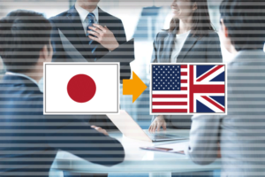 ミーティングのビジネスイメージと日本とUS/UKの国旗