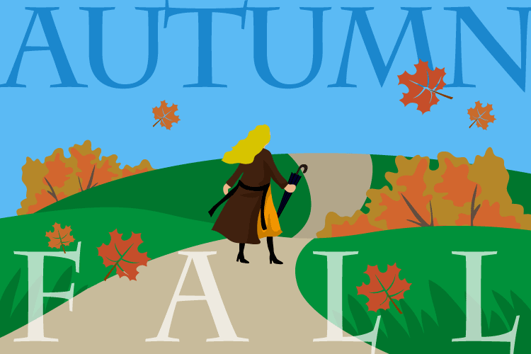 AUTUMNとFALLの文字の間の秋の小道を歩いていく女性　